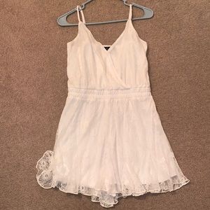 White romper with straps